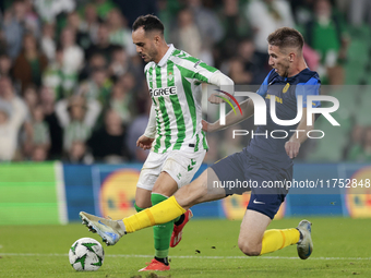 Juanmi of Real Betis hits the ball during the UEFA Conference League 2024/25 League Phase MD3 match between Real Betis and NK Celje at Benit...