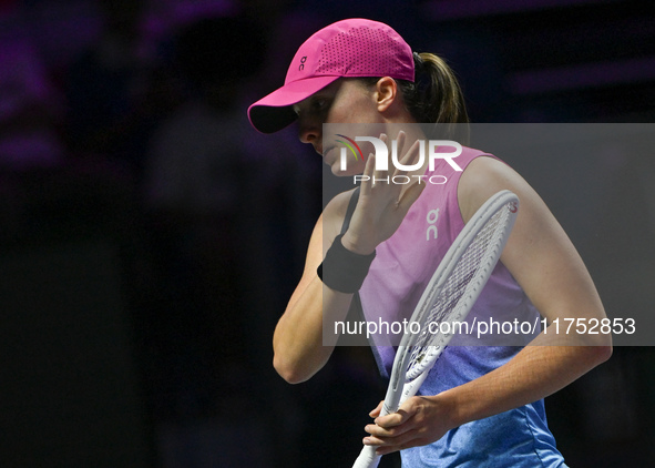 RIYADH, SAUDI ARABIA - NOVEMBER 07: Iga Swiatek of Poland during her match against Daria Kasatkina, on Day 6 of the 2024 WTA Finals, part of...