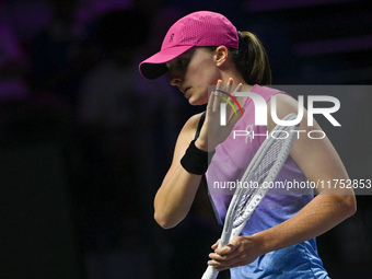 RIYADH, SAUDI ARABIA - NOVEMBER 07: Iga Swiatek of Poland during her match against Daria Kasatkina, on Day 6 of the 2024 WTA Finals, part of...