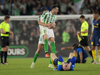 Sergi Altimira of Real Betis and Juanmi of Real Betis celebrate winning during the UEFA Conference League 2024/25 League Phase MD3 match bet...