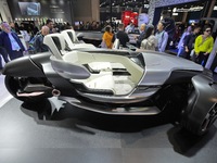 Visitors look at the Yamaha TRICERA electric three-wheel concept car at the 7th CIIE in Shanghai, China, on November 6, 2024. (