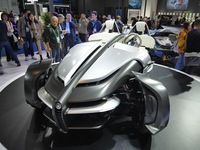 Visitors look at the Yamaha TRICERA electric three-wheel concept car at the 7th CIIE in Shanghai, China, on November 6, 2024. (