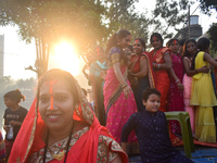 People celebrate the Chhath Puja festival in Kolkata, India, on November 8, 2024. (