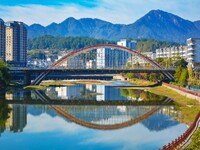 Workers carry out maintenance work on the Nanyuan Bridge in Yuexi County, Anqing City, East China's Anhui Province, on November 8, 2024. (