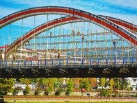 Workers carry out maintenance work on the Nanyuan Bridge in Yuexi County, Anqing City, East China's Anhui Province, on November 8, 2024. (