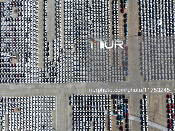 A large number of vehicles gather at the port to prepare for shipment and export overseas at the terminal of Orient Port Branch in Lianyunga...