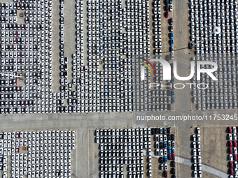 A large number of vehicles gather at the port to prepare for shipment and export overseas at the terminal of Orient Port Branch in Lianyunga...