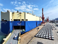 A roll-on wheel is loaded with cars for export at the terminal of Orient Port Branch in Lianyungang Port in Lianyungang, China, on November...