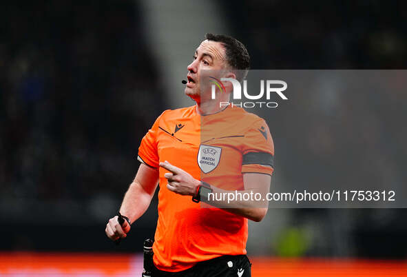 Chris Kavanagh, Referee from England,  gestures during the Eurepa League Round 4 match between Eintracht Frankfurt v SK Slavia Prague at the...