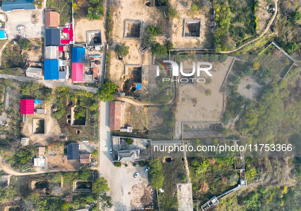 An aerial photo taken in Sanmenxia, China, on November 7, 2024, shows the Pit yard of Qucun Village, Xizhang Township, Shanzhou District, He...