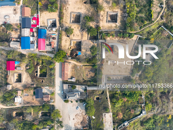 An aerial photo taken in Sanmenxia, China, on November 7, 2024, shows the Pit yard of Qucun Village, Xizhang Township, Shanzhou District, He...