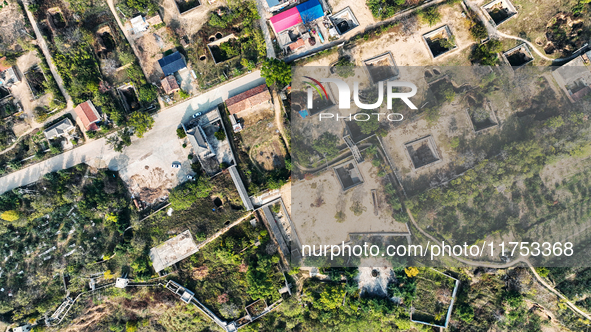 An aerial photo taken in Sanmenxia, China, on November 7, 2024, shows the Pit yard of Qucun Village, Xizhang Township, Shanzhou District, He...