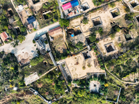 An aerial photo taken in Sanmenxia, China, on November 7, 2024, shows the Pit yard of Qucun Village, Xizhang Township, Shanzhou District, He...