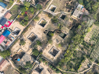 An aerial photo taken in Sanmenxia, China, on November 7, 2024, shows the Pit yard of Qucun Village, Xizhang Township, Shanzhou District, He...