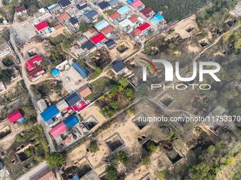 An aerial photo taken in Sanmenxia, China, on November 7, 2024, shows the Pit yard of Qucun Village, Xizhang Township, Shanzhou District, He...