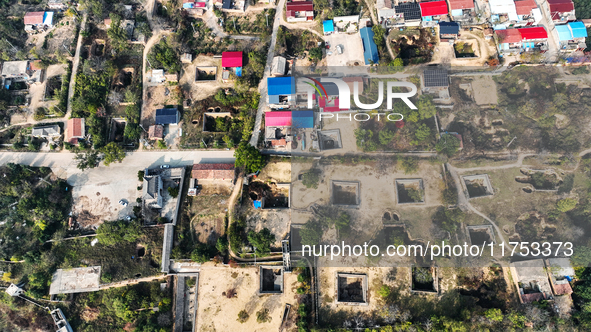 An aerial photo taken in Sanmenxia, China, on November 7, 2024, shows the Pit yard of Qucun Village, Xizhang Township, Shanzhou District, He...