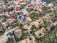 An aerial photo taken in Sanmenxia, China, on November 7, 2024, shows the Pit yard of Qucun Village, Xizhang Township, Shanzhou District, He...