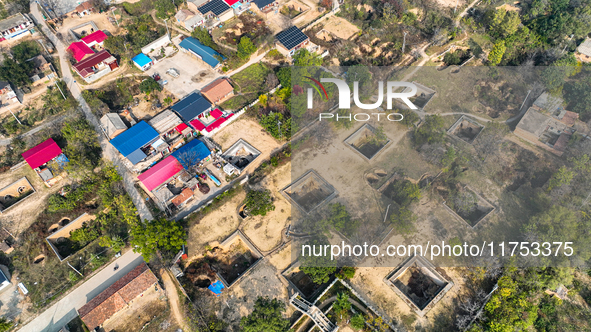 An aerial photo taken in Sanmenxia, China, on November 7, 2024, shows the Pit yard of Qucun Village, Xizhang Township, Shanzhou District, He...