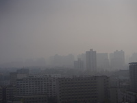 Buildings are faintly visible in the haze in Xi'an, China, on November 8, 2024. (