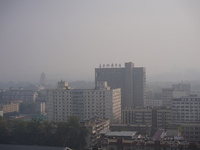 Buildings are faintly visible in the haze in Xi'an, China, on November 8, 2024. (