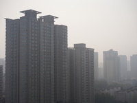 Buildings are faintly visible in the haze in Xi'an, China, on November 8, 2024. (