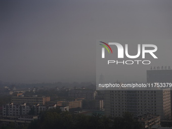 Buildings are faintly visible in the haze in Xi'an, China, on November 8, 2024. (