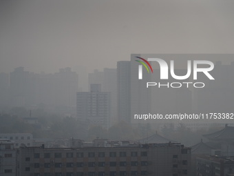 Buildings are faintly visible in the haze in Xi'an, China, on November 8, 2024. (