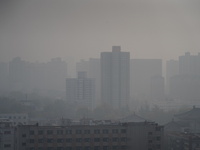 Buildings are faintly visible in the haze in Xi'an, China, on November 8, 2024. (