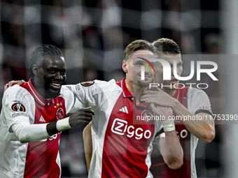 AFC Ajax Amsterdam forward Bertrand Traore, AFC Ajax Amsterdam midfielder Kenneth Taylor, and AFC Ajax Amsterdam defender Anton Gaaei partic...