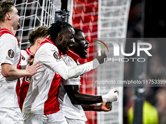 AFC Ajax Amsterdam forwards Bertrand Traore and Brian Brobbey play during the match between Ajax and Maccabi Tel Aviv at the Johan Cruijff A...