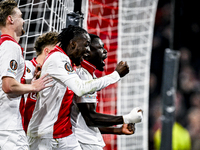 AFC Ajax Amsterdam forwards Bertrand Traore and Brian Brobbey play during the match between Ajax and Maccabi Tel Aviv at the Johan Cruijff A...