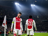 AFC Ajax Amsterdam midfielder Branco van den Boomen and AFC Ajax Amsterdam forward Bertrand Traore play during the match between Ajax and Ma...