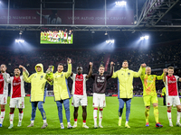 AFC Ajax Amsterdam midfielder Jordan Henderson, defender Owen Wijndal, midfielder Benjamin Tahirovic, goalkeeper Diant Ramaj, forward Brian...