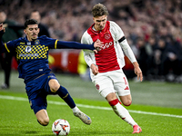 Maccabi Tel Aviv forward Dor Turgeman and AFC Ajax Amsterdam forward Mika Godts play during the match between Ajax and Maccabi Tel Aviv at t...