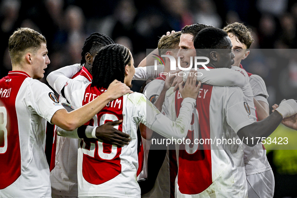 AFC Ajax Amsterdam midfielder Branco van den Boomen and AFC Ajax Amsterdam forward Brian Brobbey play during the match between Ajax and Macc...