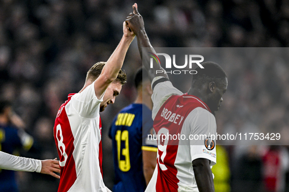 AFC Ajax Amsterdam midfielder Kenneth Taylor and AFC Ajax Amsterdam forward Brian Brobbey play during the match between Ajax and Maccabi Tel...