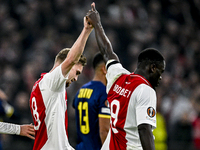 AFC Ajax Amsterdam midfielder Kenneth Taylor and AFC Ajax Amsterdam forward Brian Brobbey play during the match between Ajax and Maccabi Tel...