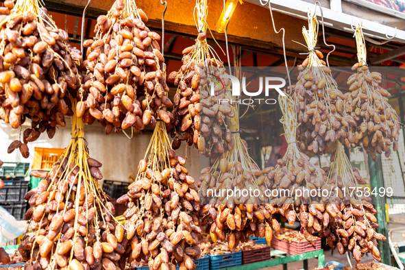 A small stand with freshly collected dates is seen on a street in Tozeur, central Tunisia on October 28, 2024. Tunisia is well known for its...