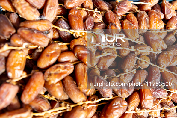 A small stand with freshly collected dates is seen on a street in Tozeur, central Tunisia on October 28, 2024. Tunisia is well known for its...