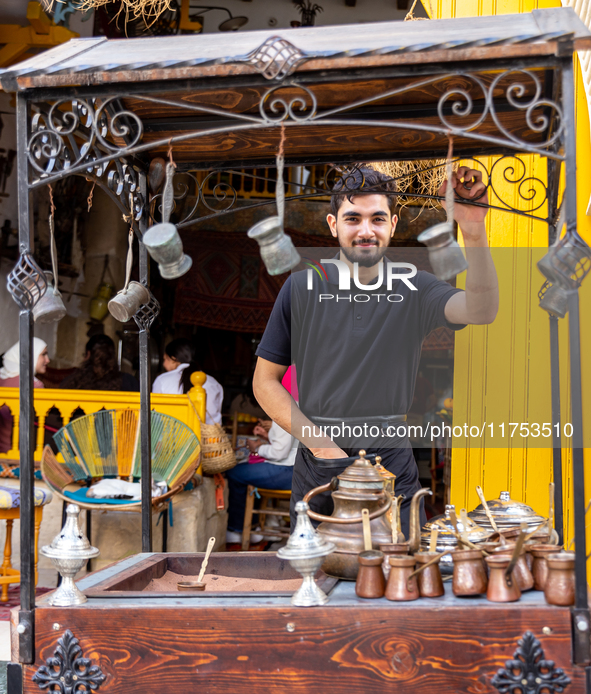 A man sells fresh coffee on a small stand on a street in Sousse, central Tunisia on November 3, 2024. Tunisia is well known for its natural...