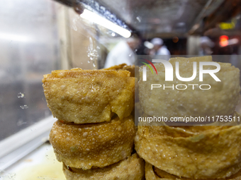 A small fresh bakes stand is seen on a street in Tunis, central Tunisia on November 2, 2024. Tunisia is well known for its natural and fresh...