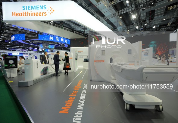 The audience visits the Siemens Medical booth at the 7th CIIE in Shanghai, China, on November 8, 2024. 