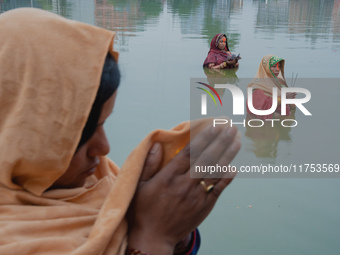 Devotees worship the rising sun in Kamalpokhari, Bhaktapur, on the last day of the Chhath Festival. Chhath is a Hindu festival dedicated to...