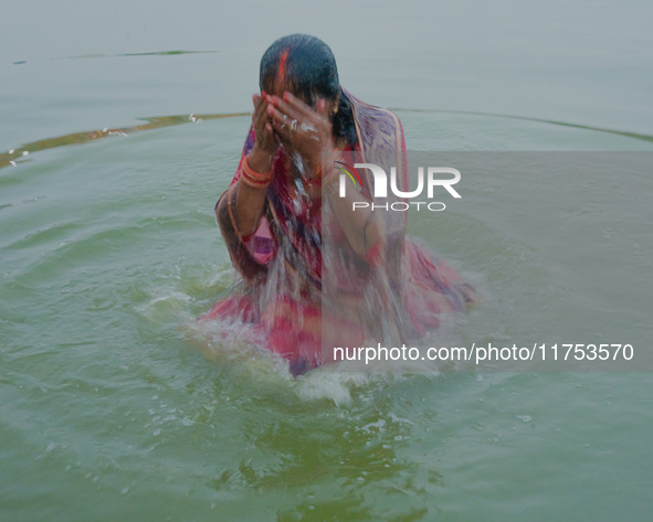 Devotees worship the rising sun in Kamalpokhari, Bhaktapur, on the last day of the Chhath Festival. Chhath is a Hindu festival dedicated to...