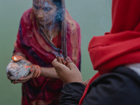 Devotees worship the rising sun in Kamalpokhari, Bhaktapur, on the last day of the Chhath Festival. Chhath is a Hindu festival dedicated to...