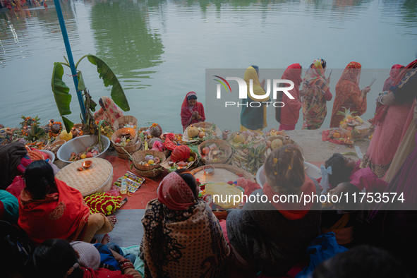 Devotees worship the rising sun in Kamalpokhari, Bhaktapur, on the last day of the Chhath Festival. Chhath is a Hindu festival dedicated to...