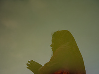 Devotees worship the rising sun in Kamalpokhari, Bhaktapur, on the last day of the Chhath Festival. Chhath is a Hindu festival dedicated to...