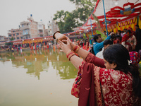 Devotees worship the rising sun in Kamalpokhari, Bhaktapur, on the last day of the Chhath Festival. Chhath is a Hindu festival dedicated to...