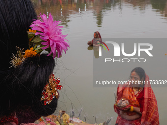 Devotees worship the rising sun in Kamalpokhari, Bhaktapur, on the last day of the Chhath Festival. Chhath is a Hindu festival dedicated to...