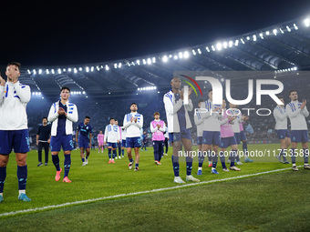 In Rome, Italy, on November 7, 2024, FC Porto players greet the fans during the UEFA Europa League 2024/25 League Phase MD4 match between S....